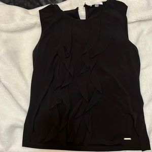 Black tank top.  Ruffles along the front.